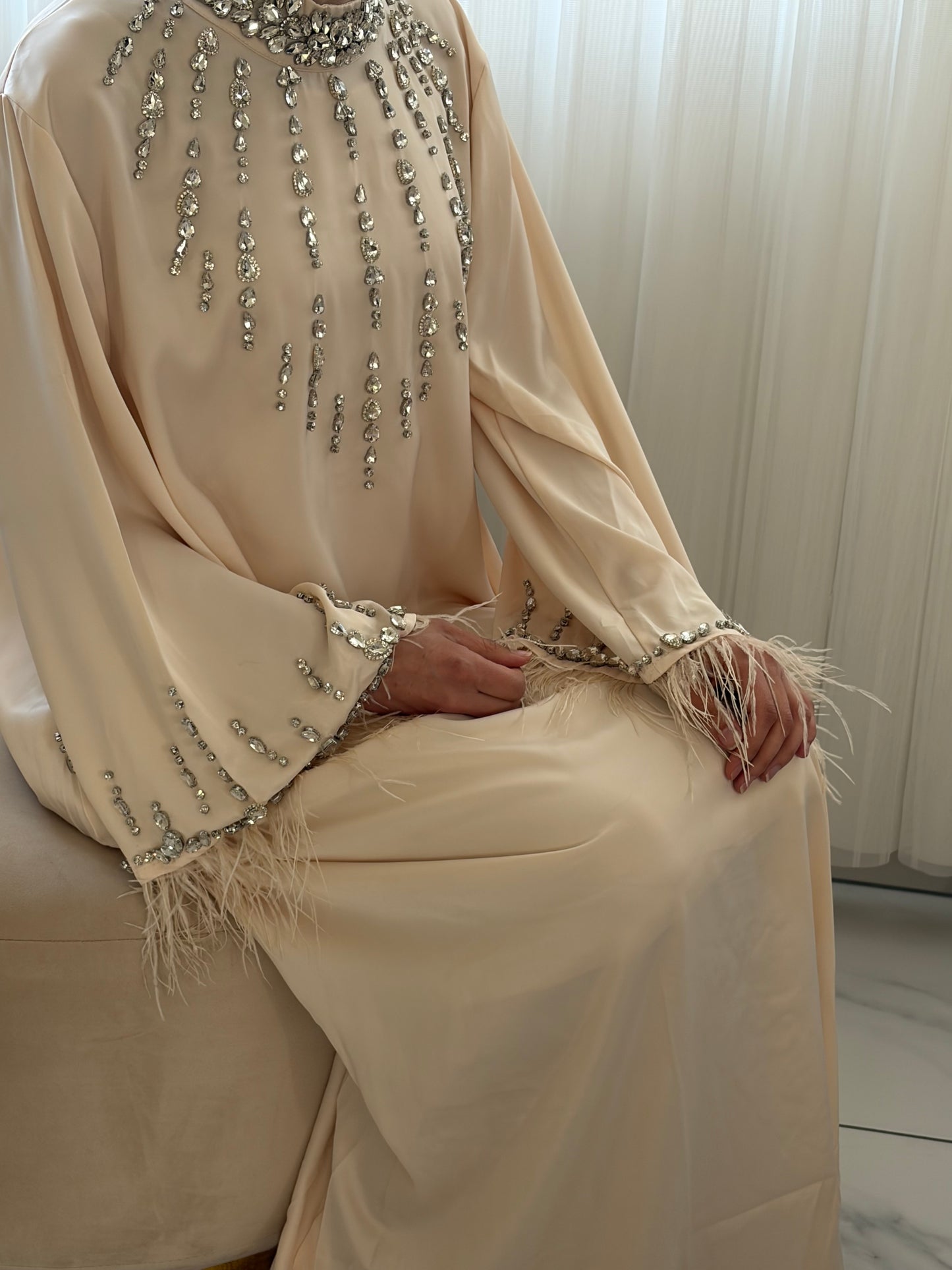 Robe strass et plumes