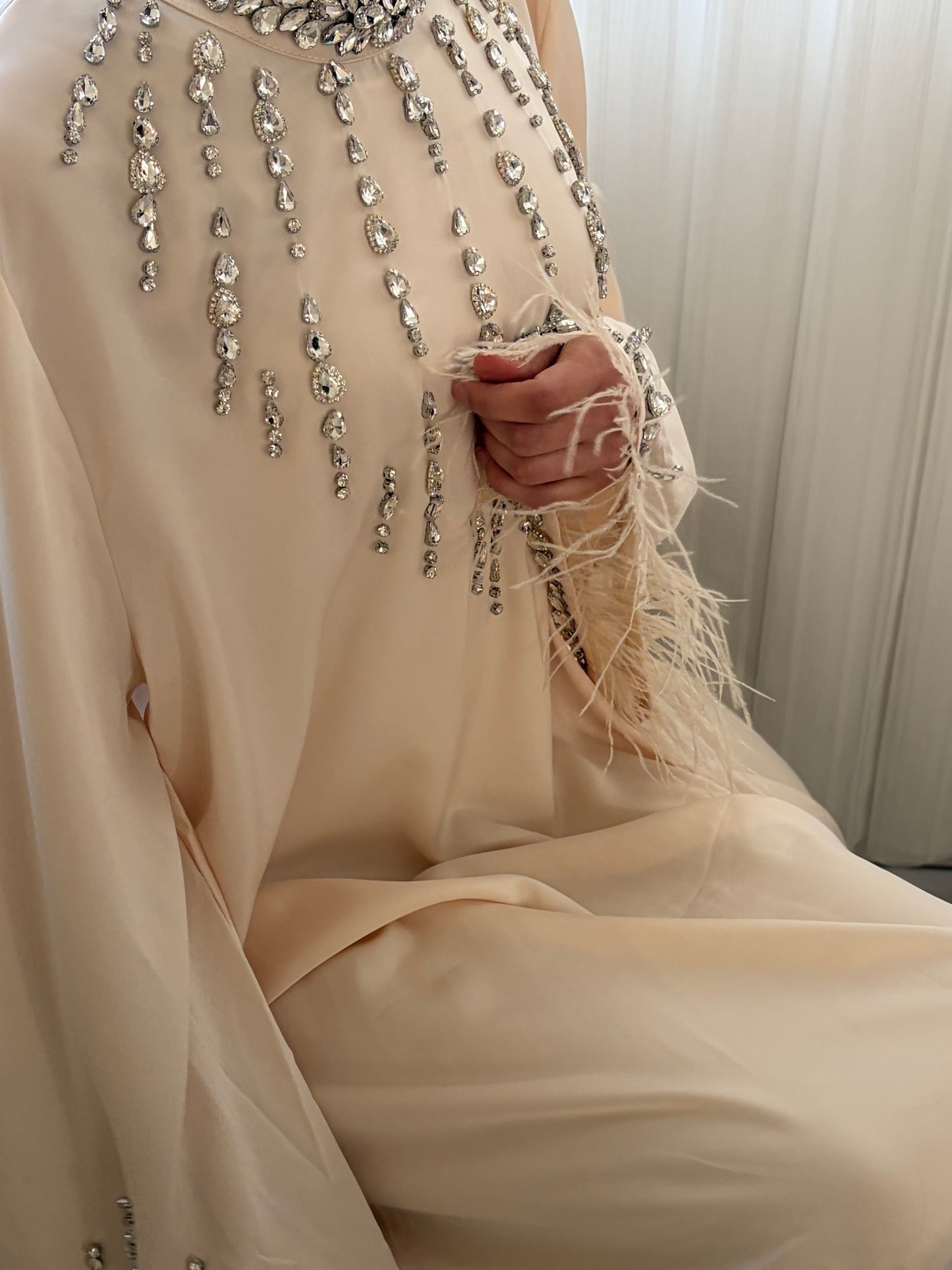 Robe strass et plumes