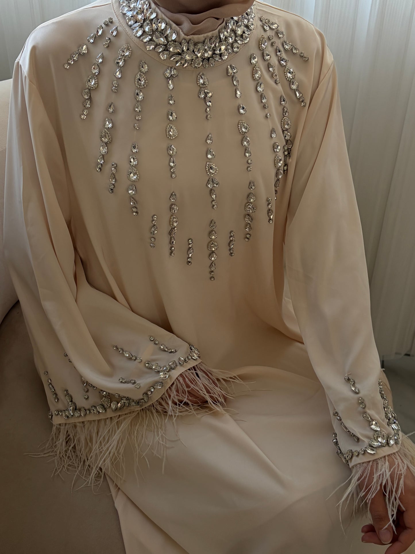 Robe strass et plumes